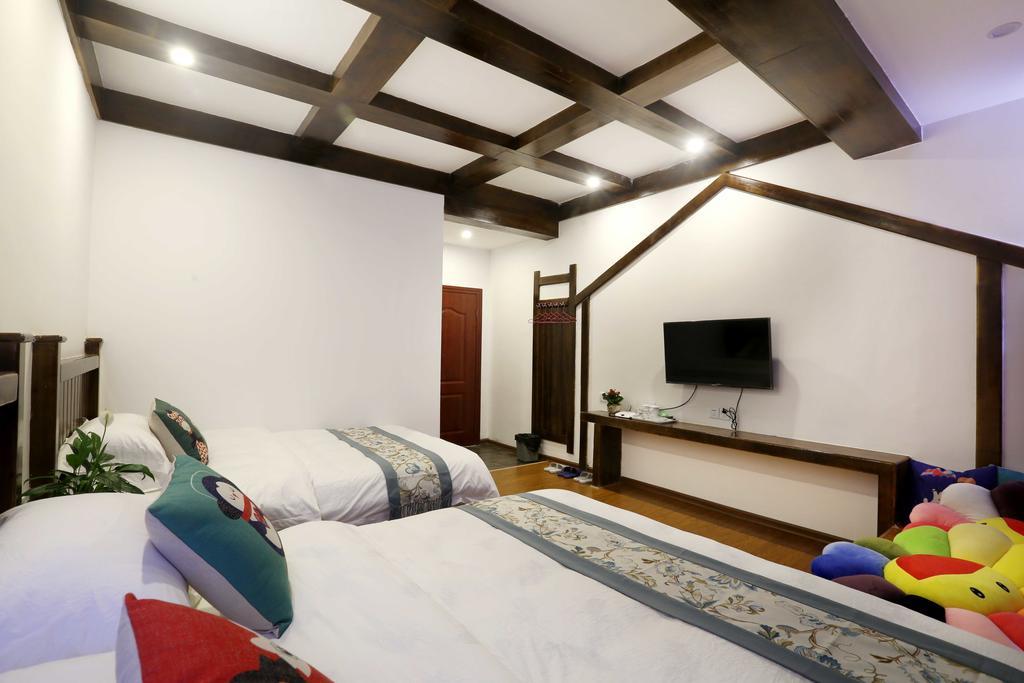 Bugu Hostel Wulingyuan Esterno foto