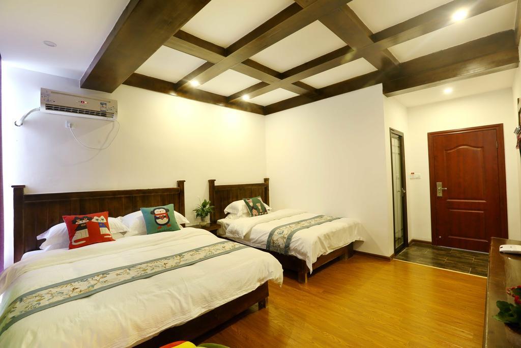 Bugu Hostel Wulingyuan Esterno foto