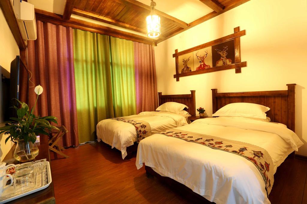 Bugu Hostel Wulingyuan Esterno foto